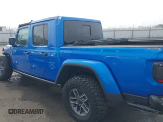 2024 Jeep Gladiator Mojave X z VIN 1C6JJTEG5RL121313, wystawiony jako IAAI lot #41013599 z przebiegiem 2 952 mil mil oraz . Historia ofert i sprzedaży dostępna na DreamBid. Obrazek 15.
