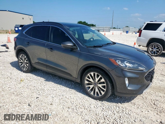 2020 Ford Escape Titanium Hybrid z VIN 1FMCU0DZ1LUC38345, wystawiony jako Copart lot #59628985 z przebiegiem 86 917 mil mil oraz Szkoda całkowita • Salvage title. Historia ofert i sprzedaży dostępna na DreamBid. Obrazek 4.