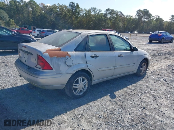 2003 Ford Focus SE z VIN 1FAFP34Z23W257426, wystawiony jako IAAI lot #40736207 z przebiegiem 87 447 mil mil oraz . Historia ofert i sprzedaży dostępna na DreamBid. Obrazek 4.