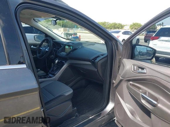 2016 Ford Escape SE with VIN 1FMCU0GXXGUB66870, listed as a IAAI auction lot 42219454 with 116,158 mi miles and . Bid and sale history available at carsss.com. Image 5.