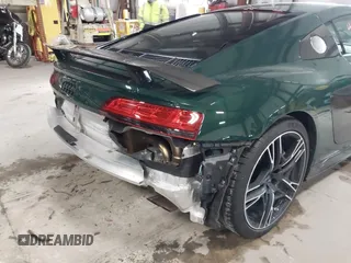2021 Audi R8 z VIN WUAKBAFX3M7900923, wystawiony jako IAAI lot #41248773 z przebiegiem 7 048 mil mil oraz . Historia ofert i sprzedaży dostępna na DreamBid. Obrazek 21.