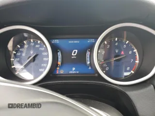 2018 Maserati Ghibli z VIN ZAM57XSA5J1287424, wystawiony jako Copart lot #71215154 z przebiegiem 20 029 mil mil oraz Szkoda całkowita • Salvage title. Historia ofert i sprzedaży dostępna na DreamBid. Obrazek 9.