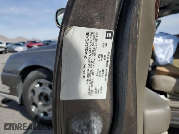 2002 Cadillac DeVille DHS z VIN 1G6KE57Y22U291523, wystawiony jako Copart lot #45711095 z przebiegiem 160 364 mil mil oraz Szkoda całkowita • Salvage title. Historia ofert i sprzedaży dostępna na DreamBid. Obrazek 14.