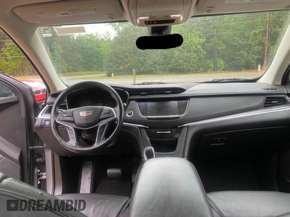 2019 Cadillac XT5 Luxury FWD with VIN 1GYKNCRS0KZ206086, listed as a Copart auction lot 54454825 with 93,621 mi miles and Salvage Title. Bid and sale history available at DreamBid. Image 9.