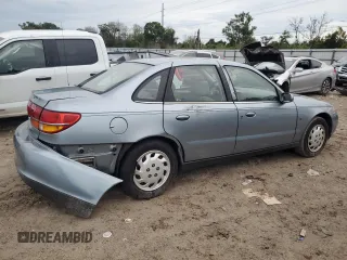 2002 Saturn LS z VIN 1G8JU54F82Y567169, wystawiony jako Copart lot #73280794 z przebiegiem 53 894 mil mil oraz Szkody całkowita. Historia ofert i sprzedaży dostępna na DreamBid. Obrazek 3.