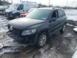 2017 Volkswagen Tiguan S with VIN WVGBV7AX7HK047973, listed as a IAAI auction lot 41197329 with 92,960 mi miles and . Bid and sale history available at DreamBid. Image 17.