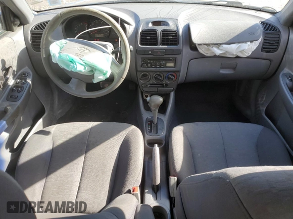 2003 Hyundai Accent GL with VIN KMHCG45C33U469496, listed as a Copart auction lot 45926595 with 77,737 mi miles and Salvage Title. Bid and sale history available at carsss.com. Image 8.