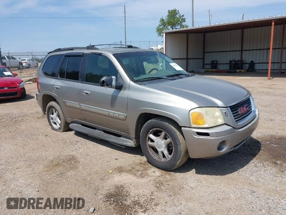 2002 GMC Envoy SLT with VIN 1GKDS13S422446808, listed as a IAAI auction lot 41896943 with 271,771 mi miles. Bid and sale history available at carsss.com. Image 1.