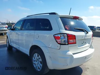 2019 Dodge Journey SE Value with VIN 3C4PDCAB1KT868065, listed as a IAAI auction lot 41642318 with 97,735 mi miles and . Bid and sale history available at DreamBid. Image 3.