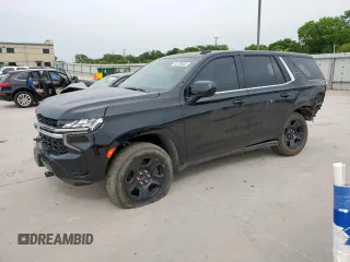 2023 Chevrolet Tahoe Commercial with VIN 1GNSCLED7PR428027, listed as a Copart auction lot 56738455 with 6,599 mi miles and Salvage title. Bid and sale history available at DreamBid. Image 1.