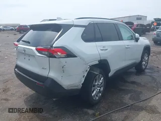 2024 Toyota RAV4 XLE Premium with VIN 2T3C1RFV5RW362478, listed as a IAAI auction lot 42504047 with 9,975 mi miles and . Bid and sale history available at DreamBid. Image 4.
