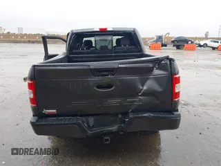 2019 Ford F-150 XL with VIN 1FTEW1C56KKC31025, listed as a IAAI auction lot 41452618 with 153,422 mi miles and . Bid and sale history available at DreamBid. Image 16.