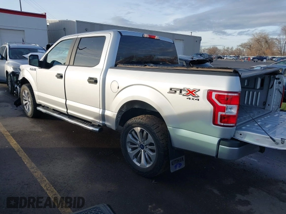 2018 Ford F-150 XL with VIN 1FTEW1EP2JKF28967, listed as a IAAI auction lot 41242743 with 54,171 mi miles. Bid and sale history available at carsss.com. Image 3.