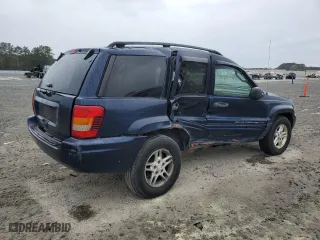 2004 Jeep Grand Cherokee Laredo with VIN 1J4GX48S64C165105, listed as a Copart auction lot 50301455 with 299,686 mi miles and Salvage Title. Bid and sale history available at carsss.com. Image 3.
