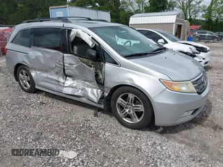 2012 Honda Odyssey Touring с VIN 5FNRL5H90CB083157, выставлен на аукционе IAAI как лот 42176609 с пробегом 250 000 миль миль и . История ставок и продаж доступна на DreamBid. Изображение 1.
