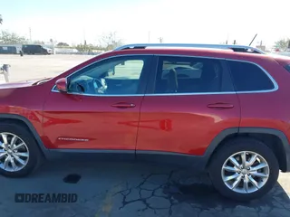 2015 Jeep Cherokee Limited with VIN 1C4PJMDB1FW599205, listed as a IAAI auction lot 41709308 with 112,415 mi miles. Bid and sale history available at carsss.com. Image 14.