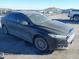 2014 Ford Fusion Titanium with VIN 3FA6P0K93ER293357, listed as a IAAI auction lot 41354955 with 176,130 mi miles. Bid and sale history available at carsss.com. Image 1.