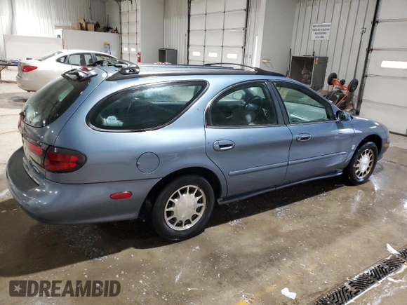 1999 Ford Taurus SE z VIN 1FAFP58S0XG301691, wystawiony jako Copart lot #81920424 z przebiegiem 203 931 mil mil oraz Szkoda całkowita • Salvage title. Historia ofert i sprzedaży dostępna na DreamBid. Obrazek 3.