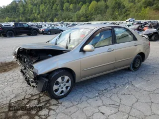2009 Kia Spectra EX with VIN KNAFE222095618177, listed as a Copart auction lot 71357534 with 132,655 mi miles and Salvage Title. Bid and sale history available at carsss.com. Image 1.