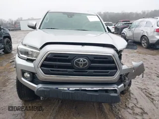 2018 Toyota Tacoma SR with VIN 3TMCZ5AN4JM148581, listed as a IAAI auction lot 41462945 with 115,655 mi miles. Bid and sale history available at carsss.com. Image 12.