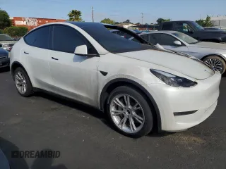 2024 Tesla Model Y Long Range with VIN 7SAYGDEE1RF025842, listed as a Copart auction lot 56226065 with Not provided miles and Non repairable. Bid and sale history available at DreamBid. Image 4.