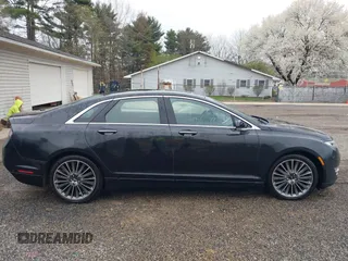 2014 Lincoln MKZ Hybrid with VIN 3LN6L2LU1ER821588, listed as a IAAI auction lot 42017129 with 151,339 mi miles and . Bid and sale history available at carsss.com. Image 12.