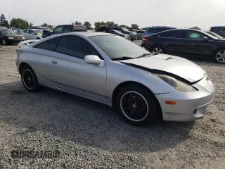 2002 Toyota Celica GT z VIN JTDDR32T320129918, wystawiony jako Copart lot #53359895 z przebiegiem 161 340 mil mil oraz Szkoda całkowita • Salvage title. Historia ofert i sprzedaży dostępna na DreamBid. Obrazek 4.