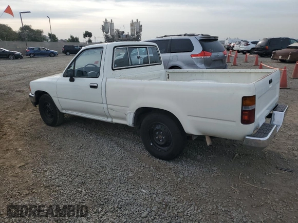 1993 Toyota Pickup DX with VIN JT4RN81P4P5168613, listed as a Copart auction lot 82611524 with 200,408 mi miles and Clean title. Bid and sale history available at DreamBid. Image 2.