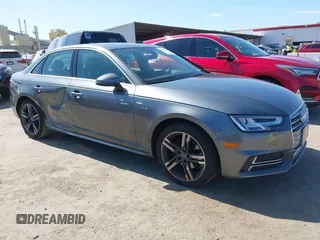 2018 Audi A4 Premium Plus z VIN WAULMAF42JA233811, wystawiony jako IAAI lot #41765655 z przebiegiem 60 985 mil mil oraz . Historia ofert i sprzedaży dostępna na DreamBid. Obrazek 1.