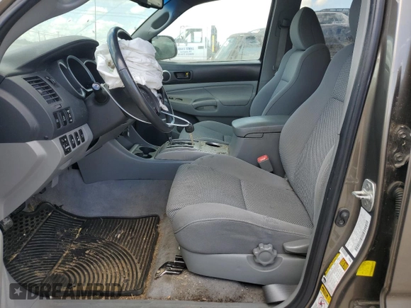 2011 Toyota Tacoma with VIN 3TMLU4EN6BM070132, listed as a Copart auction lot 56536564 with 185,256 mi miles and Salvage Title. Bid and sale history available at DreamBid. Image 7.