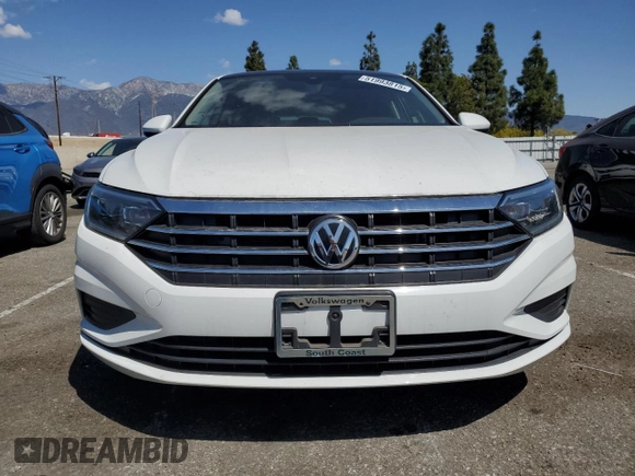 2021 Volkswagen Jetta SEL with VIN 3VWE57BU9MM082391, listed as a Copart auction lot 51993815 with 22,589 mi miles and Salvage title. Bid and sale history available at DreamBid. Image 5.
