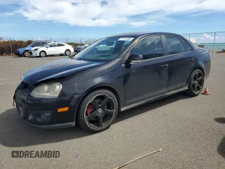 2009 Volkswagen Jetta GLI z VIN 3VWBJ71K19M071374, wystawiony jako Copart lot #77714284 z przebiegiem 61 434 mil mil oraz Szkoda całkowita • Salvage title. Historia ofert i sprzedaży dostępna na DreamBid. Obrazek 1.