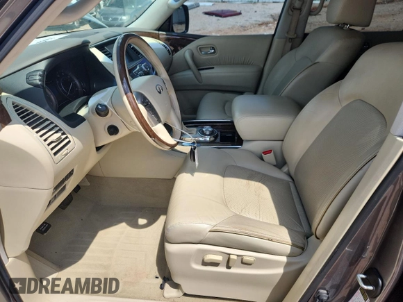 2016 Infiniti QX80 with VIN JN8AZ2NE2G9123772, listed as a Copart auction lot 63665105 with 98,304 mi miles and Salvage title. Bid and sale history available at DreamBid. Image 7.