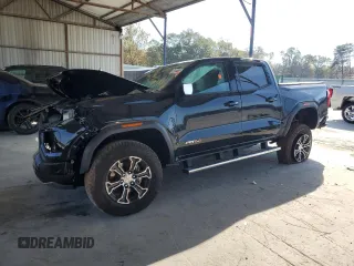 2024 GMC Canyon 4WD AT4 with VIN 1GTP6DEK1R1185858, listed as a Copart auction lot 81344984 with 0 mi miles and Salvage Title. Bid and sale history available at carsss.com. Image 1.