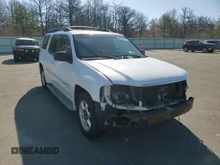 2003 GMC Envoy SLT z VIN 1GKET16S736179347, wystawiony jako Copart lot #52370775 z przebiegiem 230 623 mil mil oraz Szkoda całkowita • Salvage title. Historia ofert i sprzedaży dostępna na DreamBid. Obrazek 11.