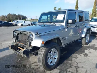 2018 Jeep Wrangler Unlimited Sport S with VIN 1C4HJWDG5JL839703, listed as a IAAI auction lot 42140205 with 61,604 mi miles and . Bid and sale history available at DreamBid. Image 20.