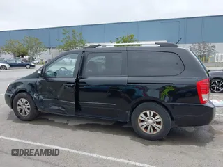 2012 Kia Sedona LX with VIN KNDMG4C78C6502141, listed as a IAAI auction lot 41725800 with 153,789 mi miles and . Bid and sale history available at carsss.com. Image 13.