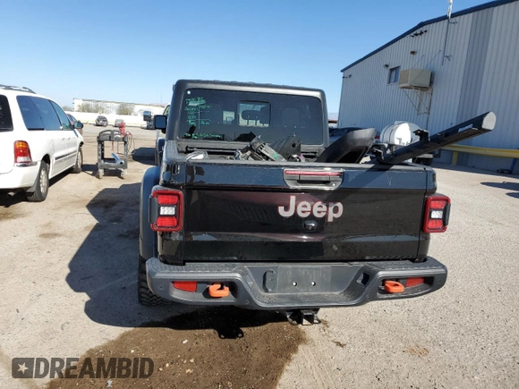 2020 Jeep Gladiator Mojave z VIN 1C6JJTEG1LL209606, wystawiony jako Copart lot #88265265 z przebiegiem 57 098 mil mil oraz Szkoda całkowita • Salvage title. Historia ofert i sprzedaży dostępna na DreamBid. Obrazek 6.