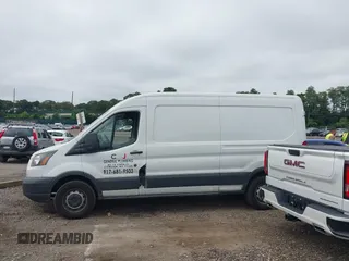 2016 Ford Transit Cargo with VIN 1FTYR2CM2GKA13205, listed as a IAAI auction lot 42697411 with 112,854 mi miles and . Bid and sale history available at DreamBid. Image 14.