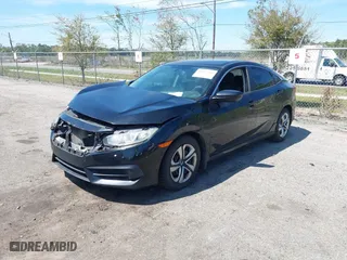 2017 Honda Civic Sedan LX with VIN 19XFC2F57HE061090, listed as a IAAI auction lot 41887402 with 129,167 mi miles. Bid and sale history available at carsss.com. Image 17.