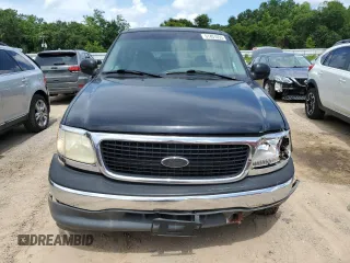 1999 Ford F-150 with VIN 1FTZX1720XKA84187, listed as a Copart auction lot 61401055 with Not provided miles and Salvage title. Bid and sale history available at DreamBid. Image 5.