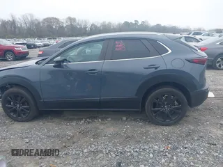 2023 Mazda CX-30 S Carbon Edition with VIN 3MVDMBCM5PM514304, listed as a IAAI auction lot 41795899 with 31,993 mi miles and . Bid and sale history available at DreamBid. Image 14.