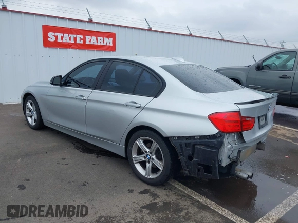 2013 BMW 3 Series 328i with VIN WBA3C1C51DF438981, listed as a IAAI auction lot 41741049 with 135,499 mi miles. Bid and sale history available at carsss.com. Image 3.