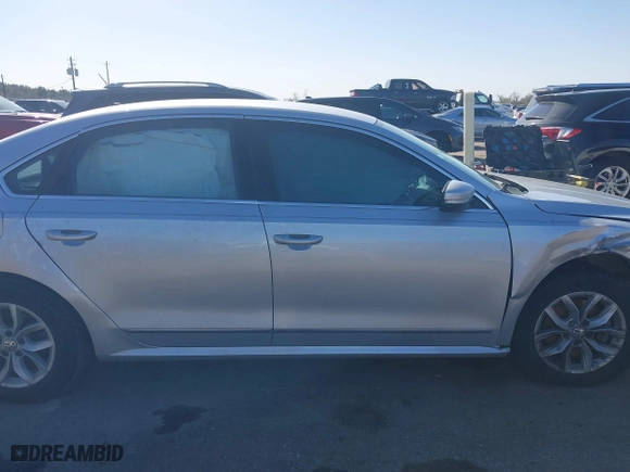 2016 Volkswagen Passat 1.8T S with VIN 1VWAS7A36GC032067, listed as a IAAI auction lot 41207782 with 123,651 mi miles. Bid and sale history available at carsss.com. Image 14.