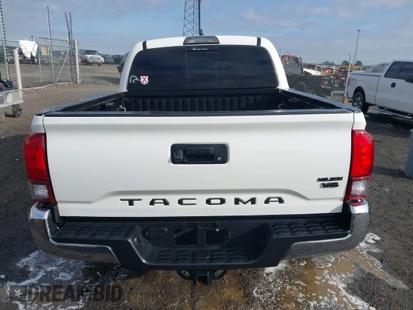 2019 Toyota Tacoma SR z VIN 3TMCZ5AN9KM284092, wystawiony jako IAAI lot #41774851 z przebiegiem 100 031 mil mil oraz . Historia ofert i sprzedaży dostępna na DreamBid. Obrazek 16.
