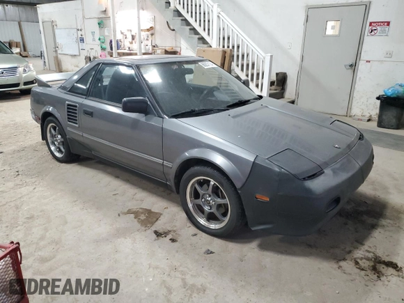 1989 Toyota MR2 z VIN JT2AW15C1K0150268, wystawiony jako Copart lot #86257134 z przebiegiem 93 969 mil mil oraz Tytuł czysty. Historia ofert i sprzedaży dostępna na DreamBid. Obrazek 4.