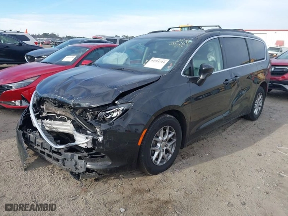 2020 Chrysler Voyager LXI with VIN 2C4RC1DG2LR262141, listed as a IAAI auction lot 41711714 with 136,011 mi miles. Bid and sale history available at carsss.com. Image 2.