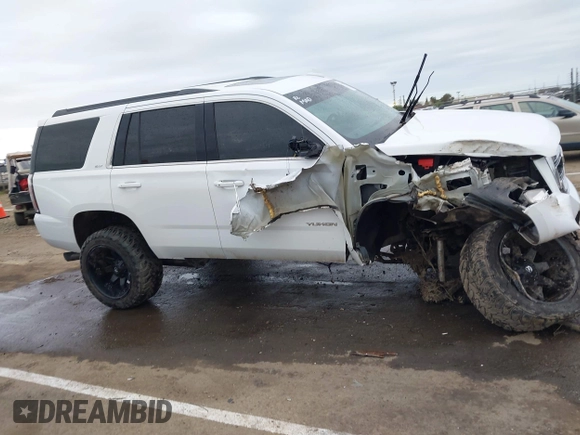 2019 GMC Yukon SLT with VIN 1GKS2BKC1KR167766, listed as a IAAI auction lot 41902532 with 97,793 mi miles. Bid and sale history available at carsss.com. Image 13.