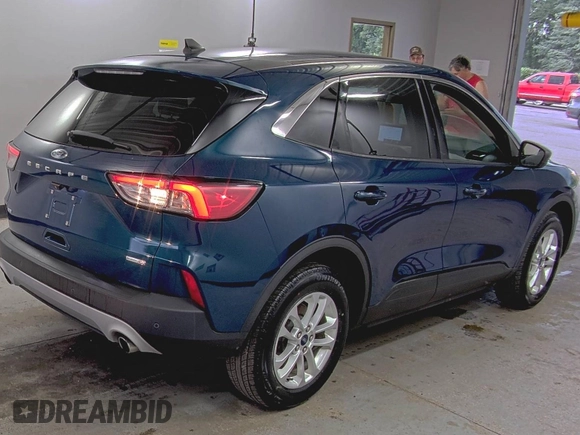 2020 Ford Escape SE with VIN 1FMCU9G65LUB80892, listed as a IAAI auction lot 42715723 with 86,362 mi miles and . Bid and sale history available at DreamBid. Image 21.