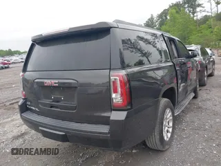 2015 GMC Yukon XL SLE z VIN 1GKS1GKC8FR507436, wystawiony jako IAAI lot #42113696 z przebiegiem Nie podano mil oraz . Historia ofert i sprzedaży dostępna na DreamBid. Obrazek 4.